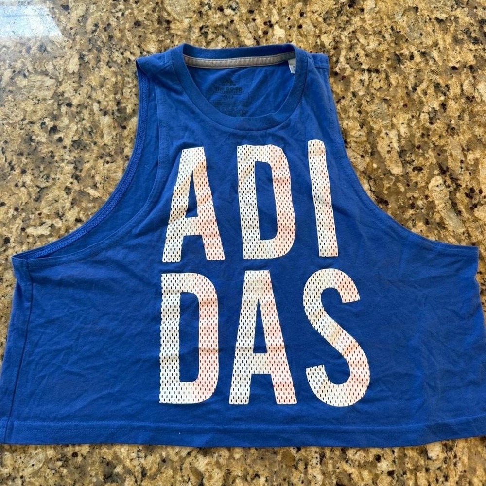 Adidas women's sleeveless graphic tank in bright royal blue . Women's Small